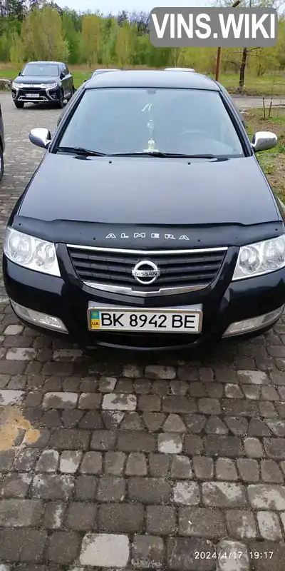 Седан Nissan Almera 2012 1.6 л. Ручна / Механіка обл. Київська, Ірпінь - Фото 1/21