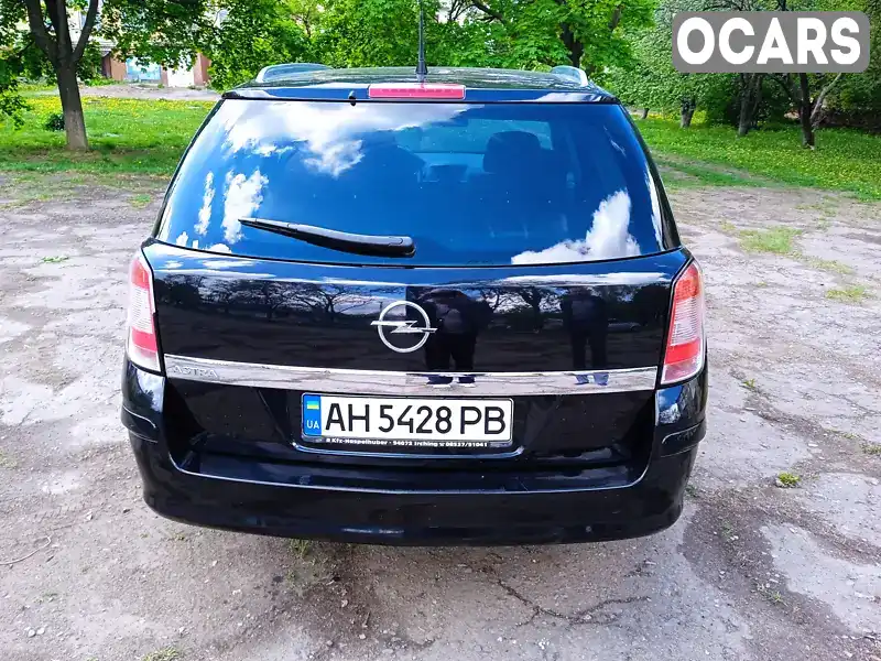 W0L0AHL3592120710 Opel Astra 2009 Универсал 1.6 л. Фото 7