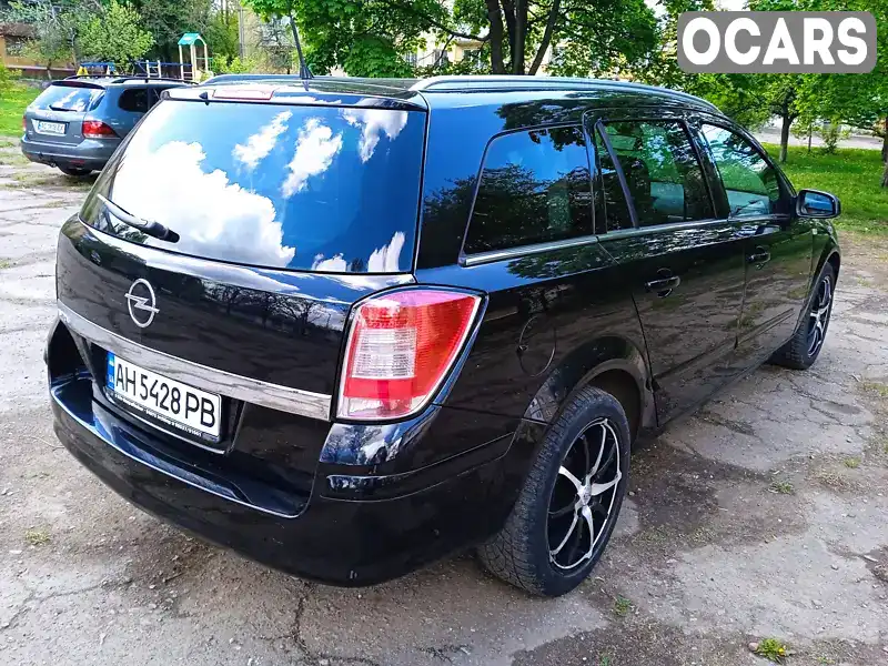 W0L0AHL3592120710 Opel Astra 2009 Универсал 1.6 л. Фото 8