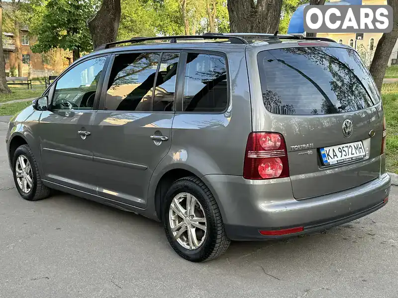 Мінівен Volkswagen Touran 2010 1.6 л. Ручна / Механіка обл. Дніпропетровська, Кам'янське (Дніпродзержинськ) - Фото 1/21