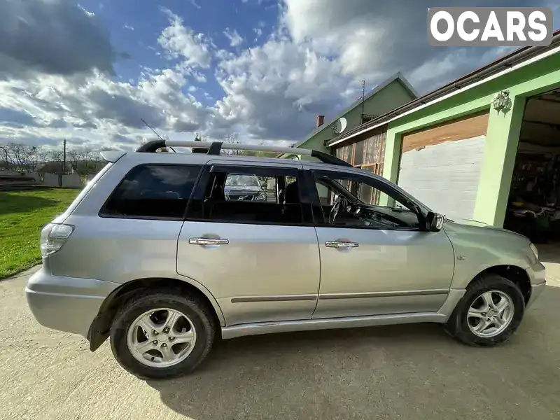 JMBXNCU2W3U010253 Mitsubishi Outlander 2003 Внедорожник / Кроссовер 2 л. Фото 6