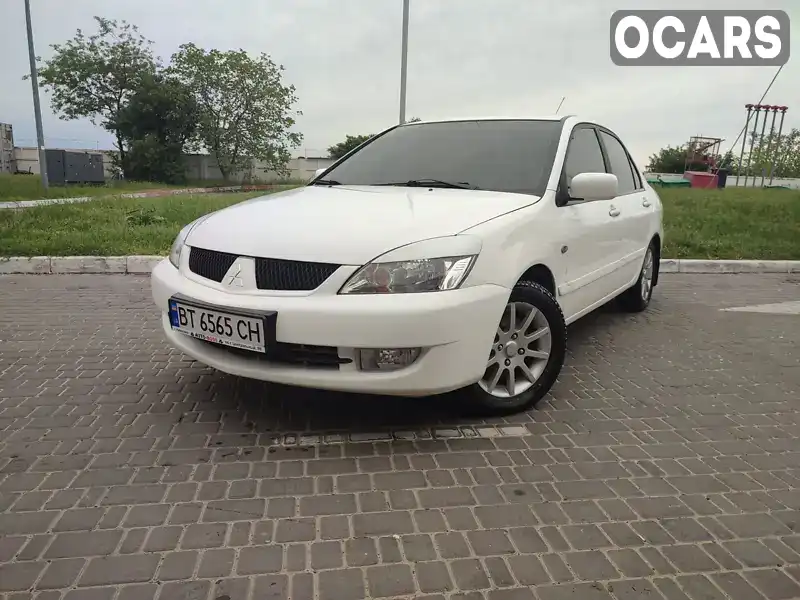 Седан Mitsubishi Lancer 2008 1.6 л. Ручна / Механіка обл. Одеська, Одеса - Фото 1/21