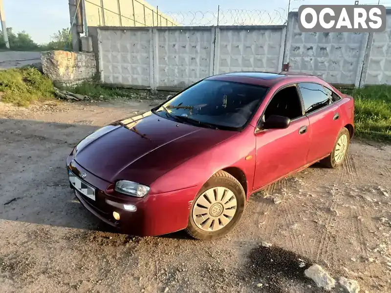 Хетчбек Mazda 323 1996 1.49 л. Ручна / Механіка обл. Хмельницька, Хмельницький - Фото 1/19