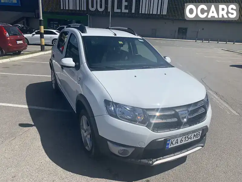 Хетчбек Dacia Sandero 2015 0.9 л. Робот обл. Київська, Київ - Фото 1/21