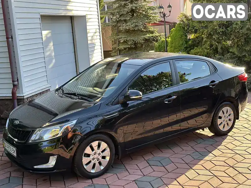 Седан Kia Rio 2013 1.59 л. Автомат обл. Хмельницька, Хмельницький - Фото 1/21