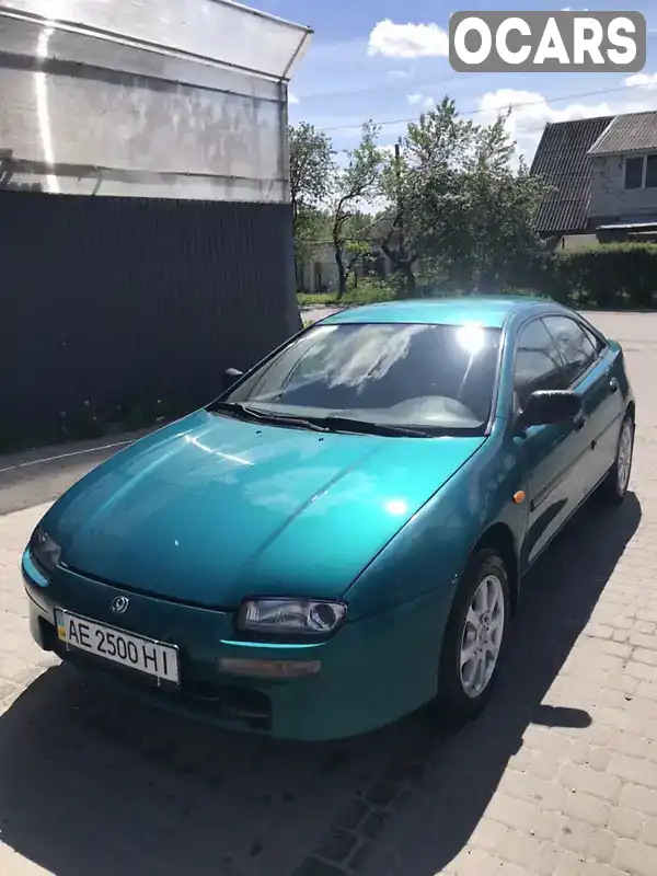 Хетчбек Mazda 323 1996 1.5 л. Ручна / Механіка обл. Дніпропетровська, Дніпро (Дніпропетровськ) - Фото 1/14