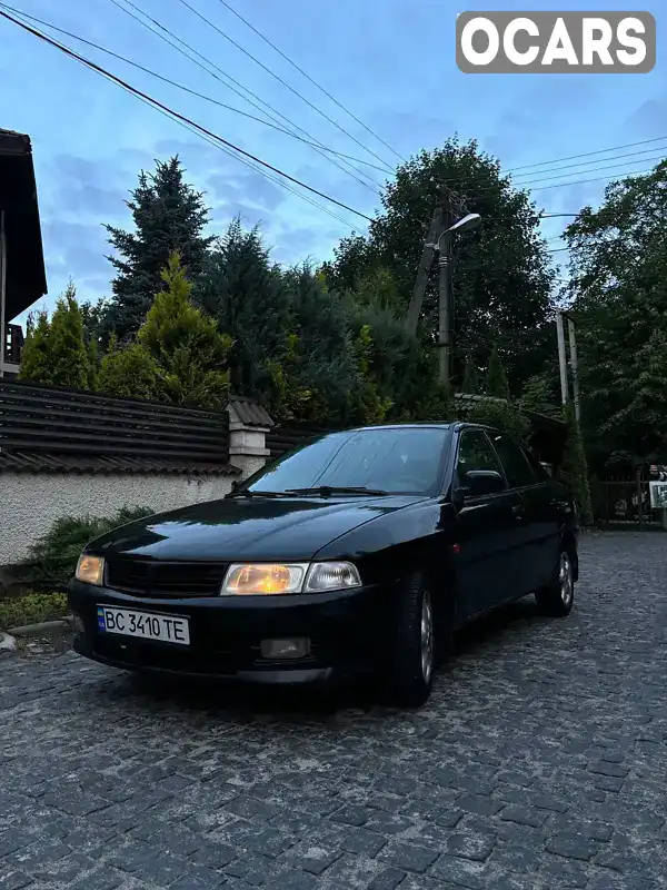 Седан Mitsubishi Lancer 2000 1.3 л. Ручна / Механіка обл. Львівська, Львів - Фото 1/13