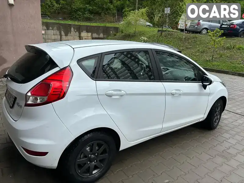 WF0DXXGAKDEU86767 Ford Fiesta 2014 Хэтчбек 1 л. Фото 2