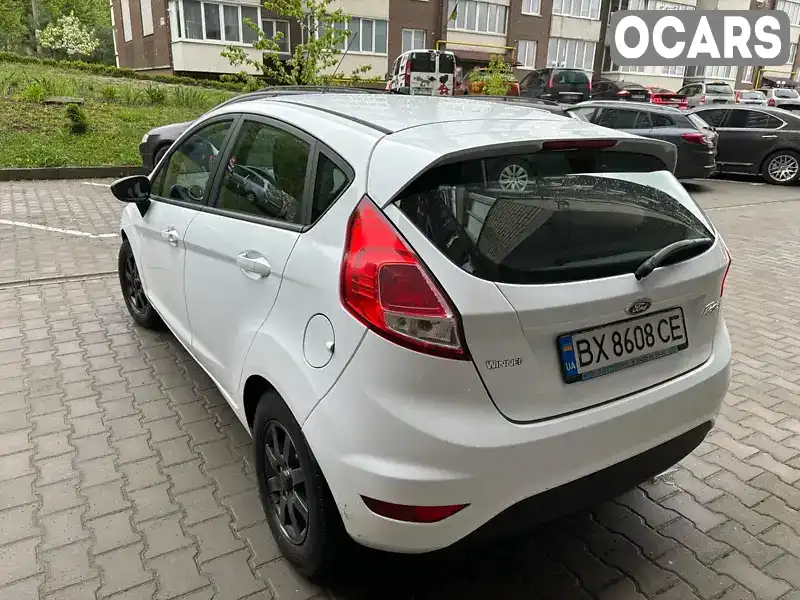 WF0DXXGAKDEU86767 Ford Fiesta 2014 Хэтчбек 1 л. Фото 8