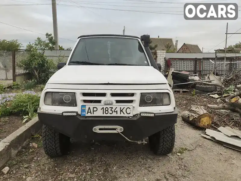 Позашляховик / Кросовер Chevrolet Tracker 1997 1.59 л. Автомат обл. Запорізька, Запоріжжя - Фото 1/8