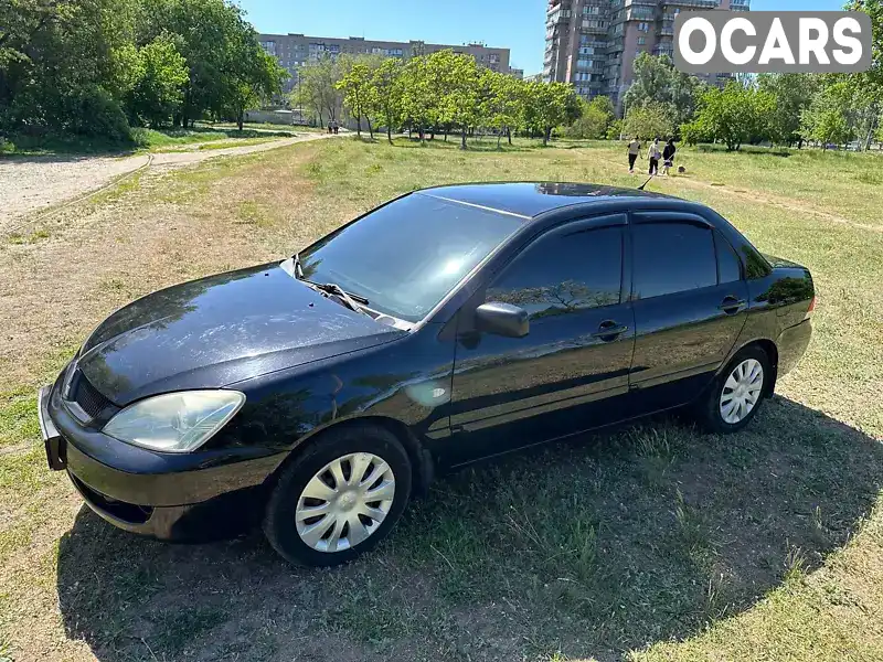 Седан Mitsubishi Lancer 2006 1.58 л. Ручна / Механіка обл. Дніпропетровська, Дніпро (Дніпропетровськ) - Фото 1/21