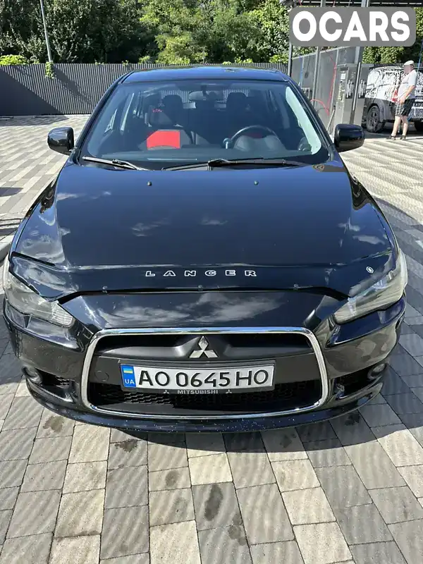 Хэтчбек Mitsubishi Lancer 2009 1.8 л. Вариатор обл. Закарпатская, Ужгород - Фото 1/14