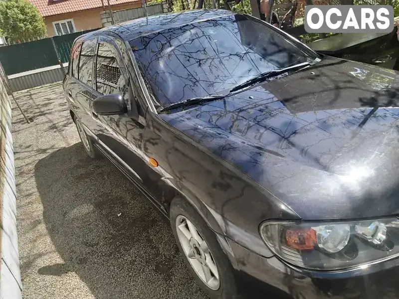 Хетчбек Nissan Almera 2003 1.5 л. Ручна / Механіка обл. Закарпатська, Міжгір'я - Фото 1/11