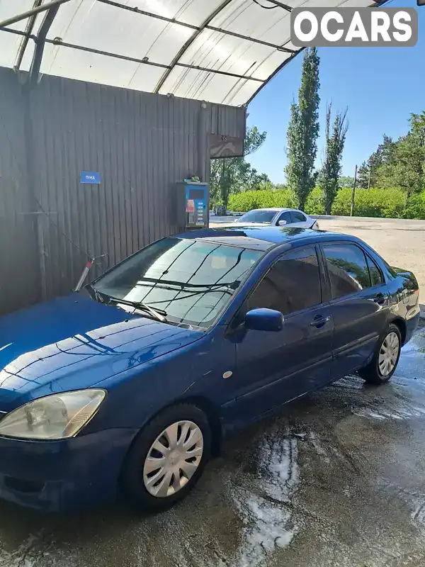 Седан Mitsubishi Lancer 2005 1.58 л. Ручна / Механіка обл. Дніпропетровська, Павлоград - Фото 1/11