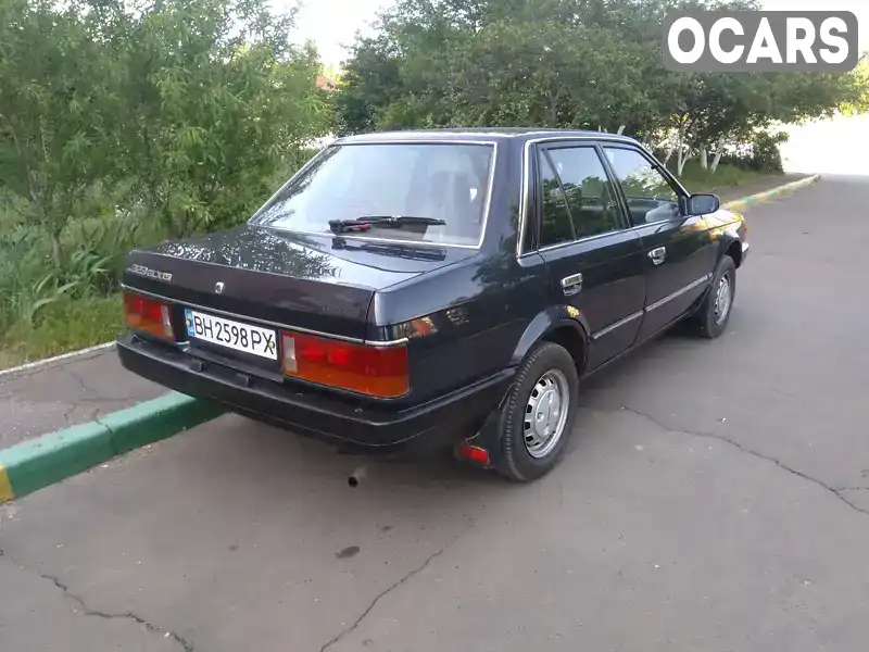 Седан Mazda 323 1986 null_content л. Ручна / Механіка обл. Одеська, Білгород-Дністровський - Фото 1/11