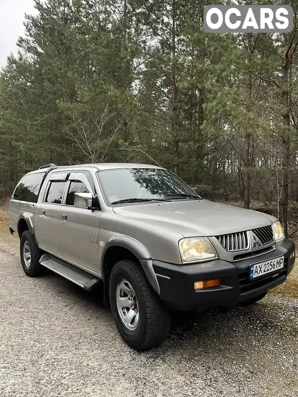 Пикап Mitsubishi L 200 2005 2.48 л. Ручная / Механика обл. Харьковская, Балаклея - Фото 1/21