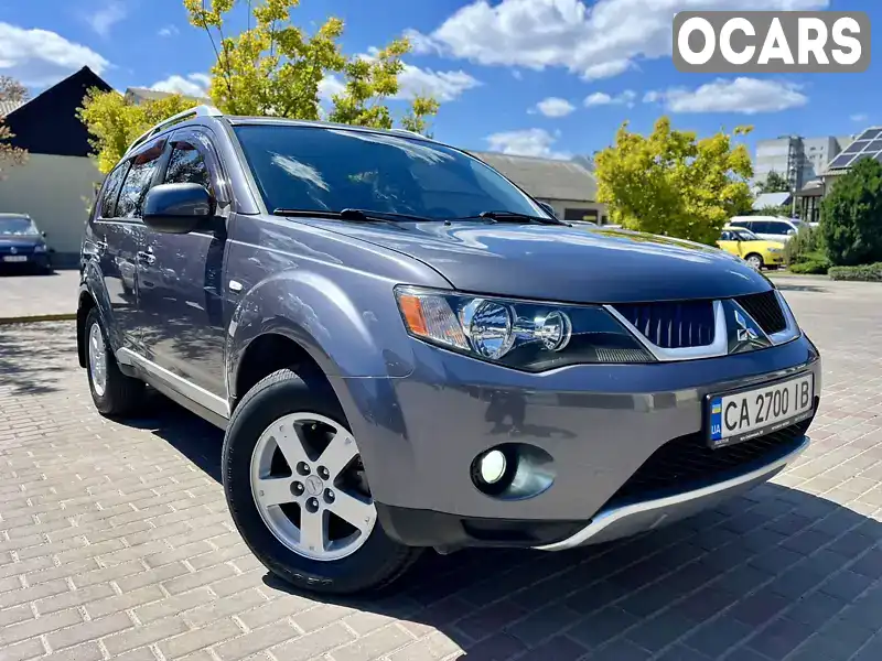 Внедорожник / Кроссовер Mitsubishi Outlander XL 2008 2.4 л. Автомат обл. Черкасская, Черкассы - Фото 1/21