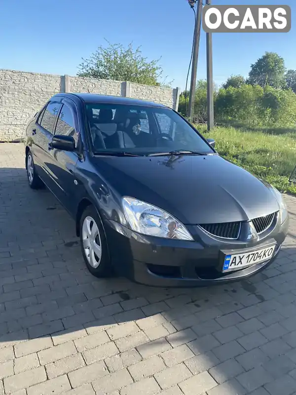 Седан Mitsubishi Lancer 2004 1.58 л. Ручна / Механіка обл. Харківська, Нова Водолага - Фото 1/7