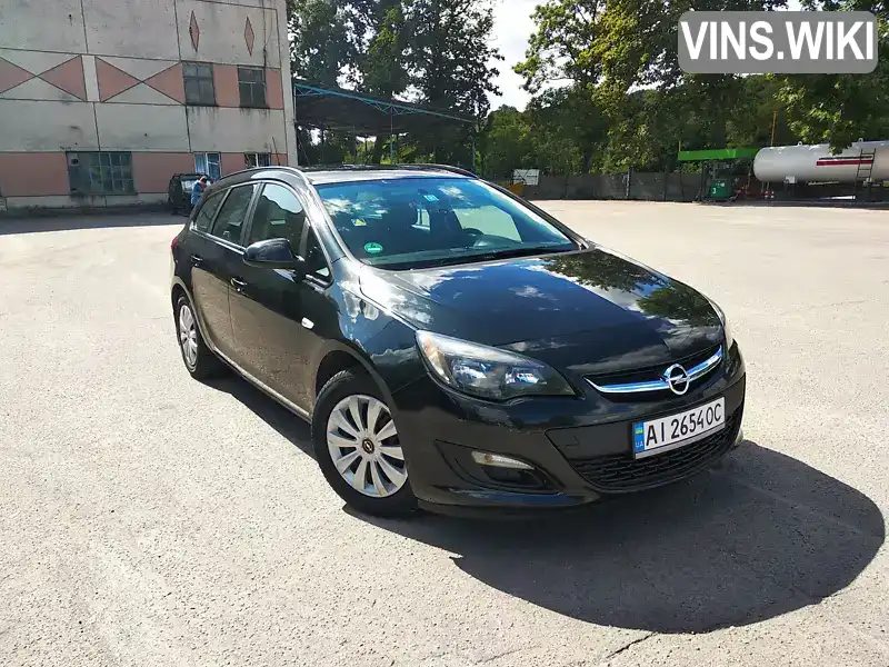 Універсал Opel Astra 2013 1.69 л. Ручна / Механіка обл. Вінницька, Козятин - Фото 1/18