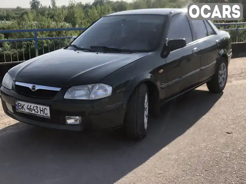 Седан Mazda 323 2000 1.5 л. обл. Ровенская, Ровно - Фото 1/12