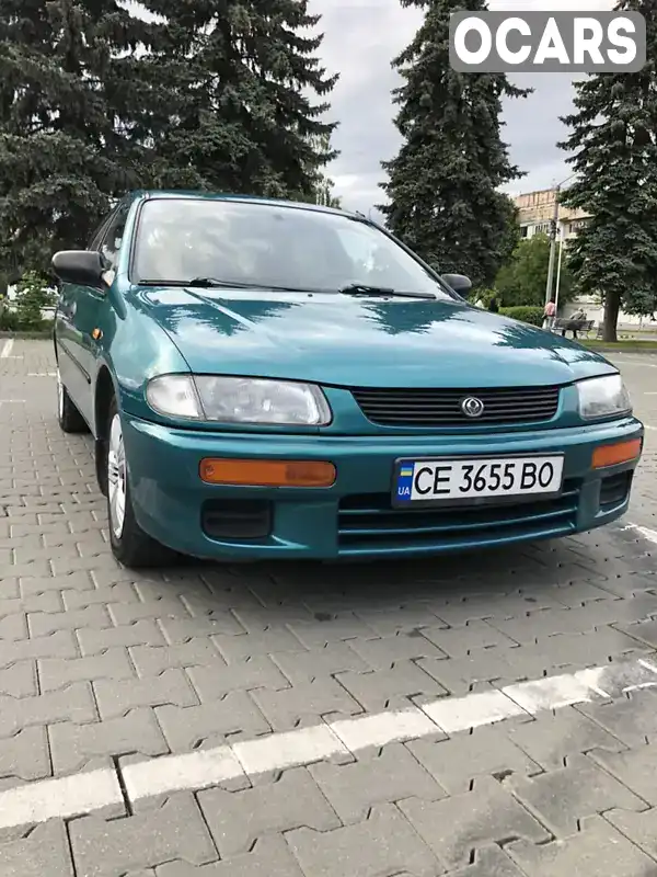 Седан Mazda 323 1996 1.5 л. Ручная / Механика обл. Черновицкая, Черновцы - Фото 1/19