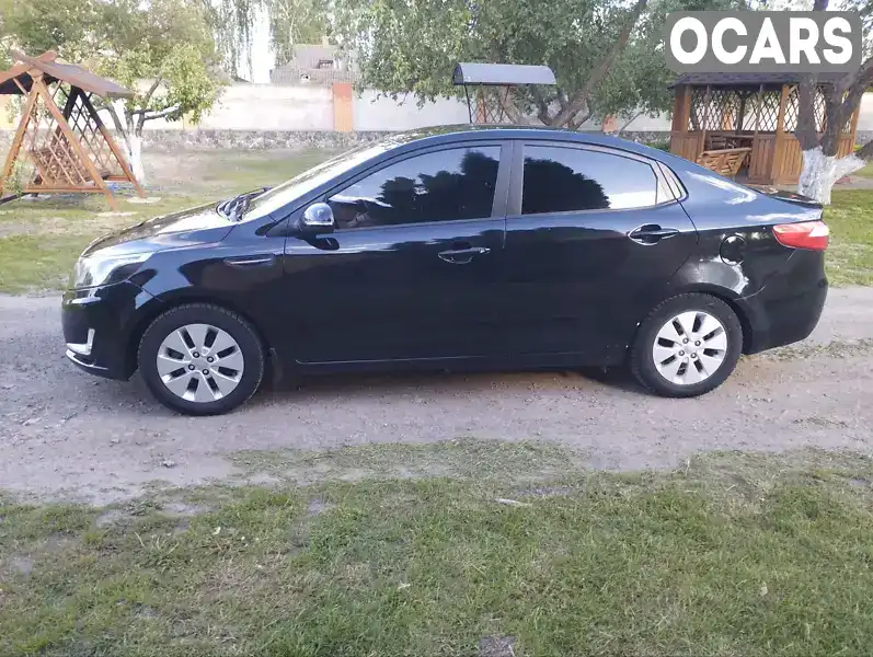 Седан Kia Rio 2013 1.59 л. Ручна / Механіка обл. Сумська, Ромни - Фото 1/21