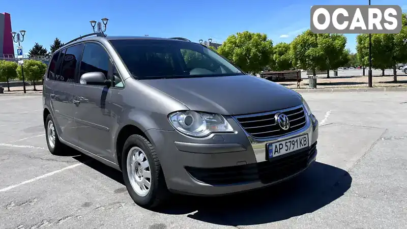 Мінівен Volkswagen Touran 2008 1.9 л. Ручна / Механіка обл. Запорізька, Запоріжжя - Фото 1/12