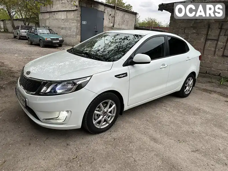 Седан Kia Rio 2012 1.4 л. Ручна / Механіка обл. Дніпропетровська, Кривий Ріг - Фото 1/21