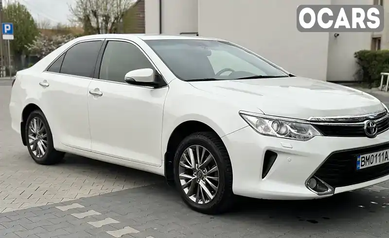 Седан Toyota Camry 2015 2.49 л. Автомат обл. Сумська, Охтирка - Фото 1/22