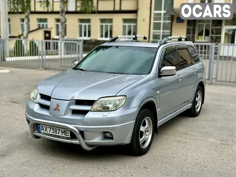 Позашляховик / Кросовер Mitsubishi Outlander 2003 2.38 л. Автомат обл. Харківська, Харків - Фото 1/21