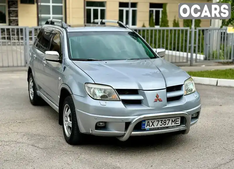 JMYXRCU4W3U779506 Mitsubishi Outlander 2003 Позашляховик / Кросовер 2.35 л. Фото 2