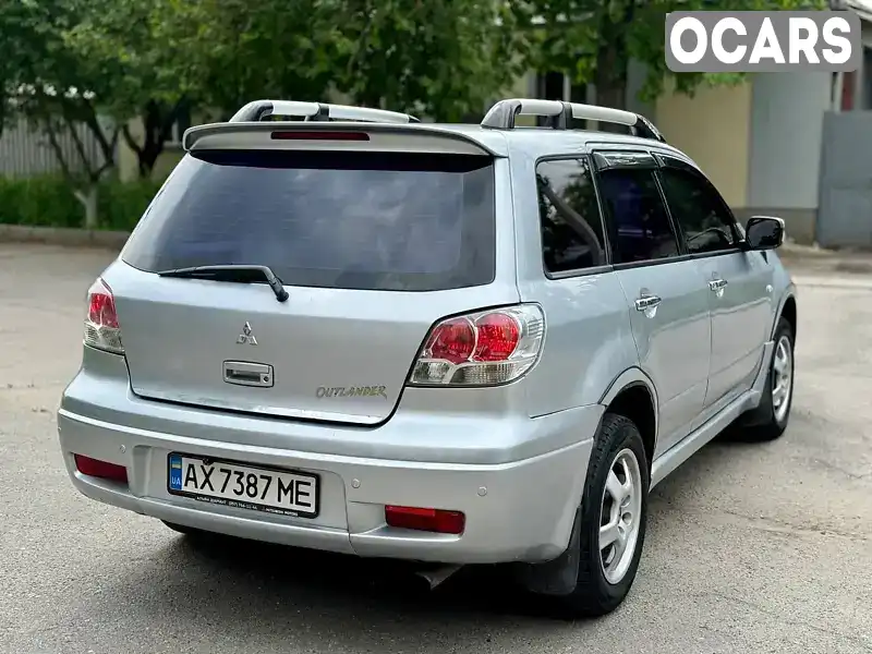 JMYXRCU4W3U779506 Mitsubishi Outlander 2003 Внедорожник / Кроссовер 2.35 л. Фото 3