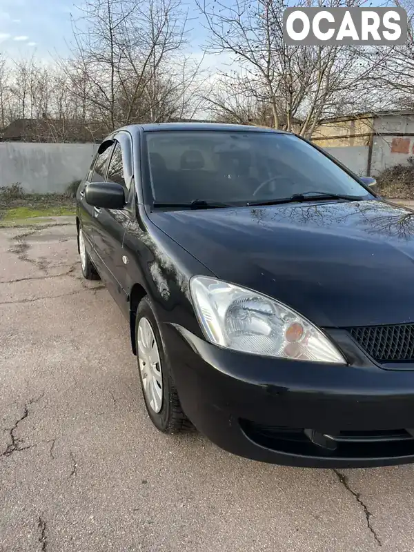 Седан Mitsubishi Lancer 2009 1.58 л. Ручна / Механіка обл. Хмельницька, Хмельницький - Фото 1/10