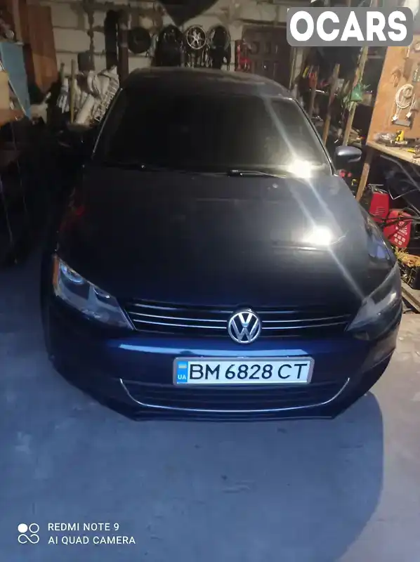 Седан Volkswagen Jetta 2014 1.8 л. Автомат обл. Сумська, Конотоп - Фото 1/8