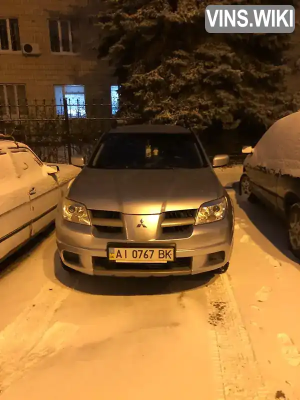 Позашляховик / Кросовер Mitsubishi Outlander 2008 2.38 л. Автомат обл. Київська, Київ - Фото 1/21