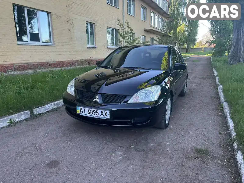 Седан Mitsubishi Lancer 2007 1.58 л. Ручна / Механіка обл. Чернігівська, Прилуки - Фото 1/21