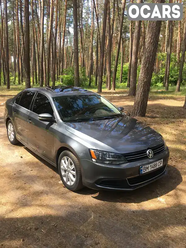 Седан Volkswagen Jetta 2013 2.5 л. Автомат обл. Сумська, Охтирка - Фото 1/14