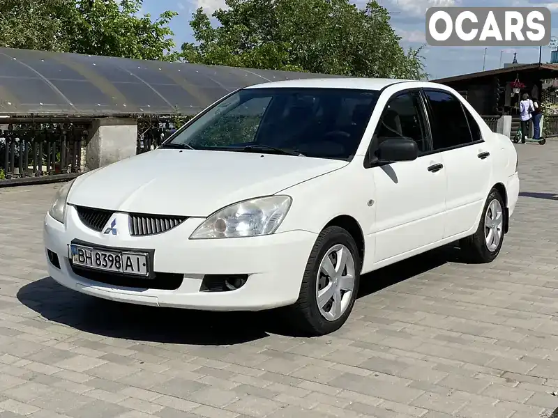 Седан Mitsubishi Lancer 2003 1.58 л. Ручна / Механіка обл. Дніпропетровська, Дніпро (Дніпропетровськ) - Фото 1/21