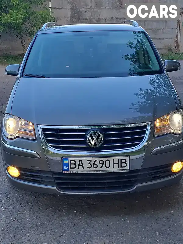 Минивэн Volkswagen Touran 2009 1.97 л. Автомат обл. Кировоградская, Добровеличковка - Фото 1/19