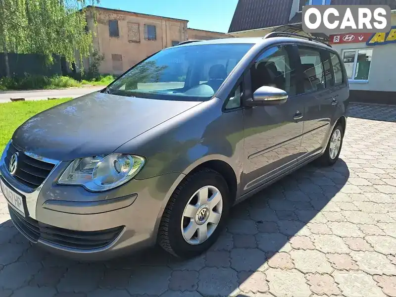 Мінівен Volkswagen Touran 2010 1.4 л. Ручна / Механіка обл. Житомирська, Коростень - Фото 1/21