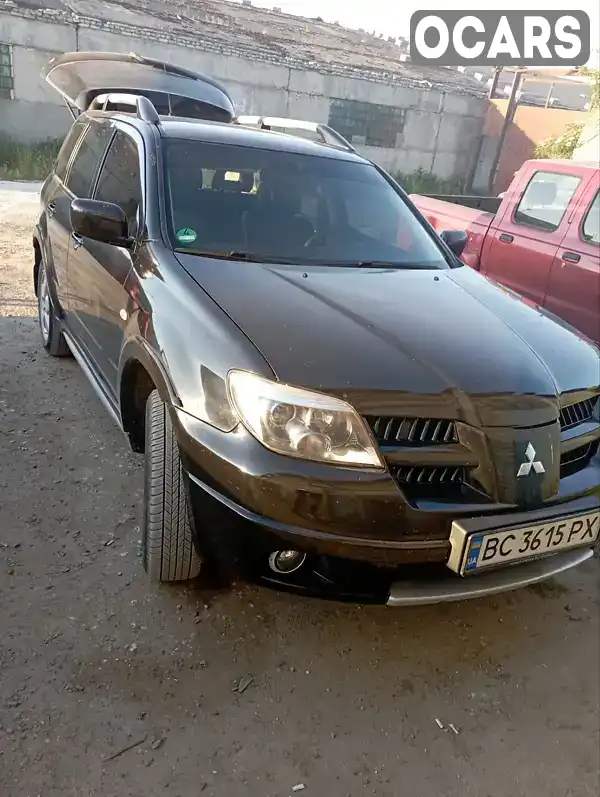 Внедорожник / Кроссовер Mitsubishi Outlander 2007 2.4 л. Автомат обл. Львовская, Городок - Фото 1/17