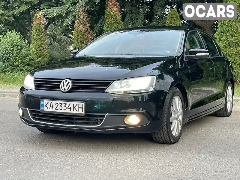 Седан Volkswagen Jetta 2013 1.98 л. Автомат обл. Київська, Київ - Фото 1/18