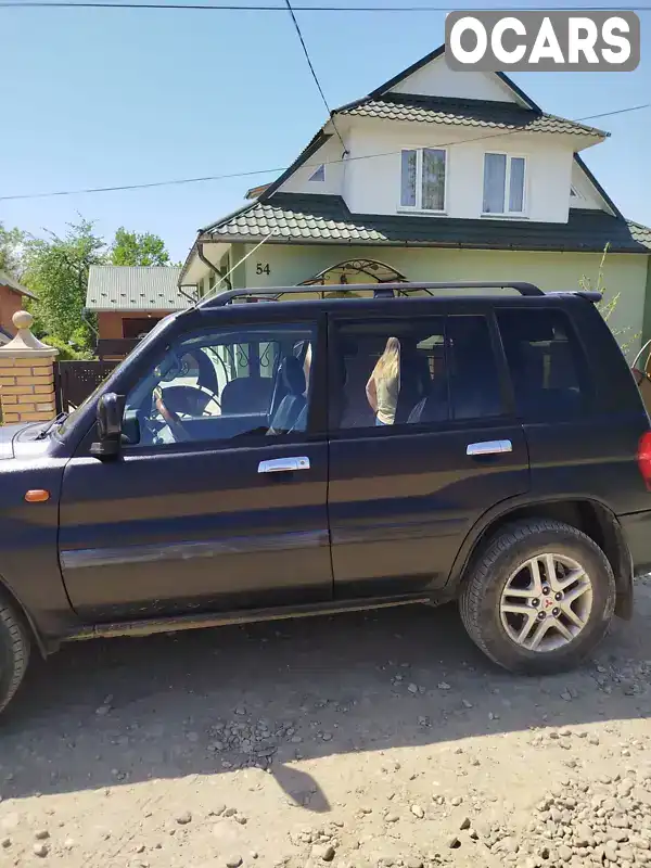 JMP0NH77W3X016199 Mitsubishi Pajero Pinin 2003 Внедорожник / Кроссовер 2 л. Фото 2