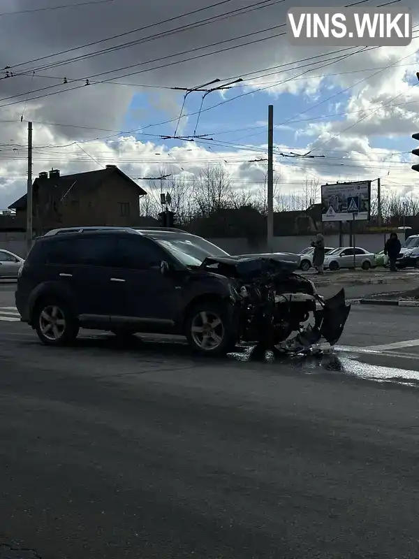 Внедорожник / Кроссовер Mitsubishi Outlander XL 2008 2.4 л. Вариатор обл. Харьковская, Харьков - Фото 1/12