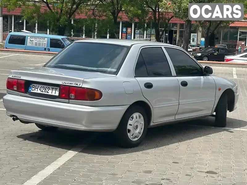 JMBSNCB1APU505137 Mitsubishi Lancer 1993 Седан 1.3 л. Фото 5