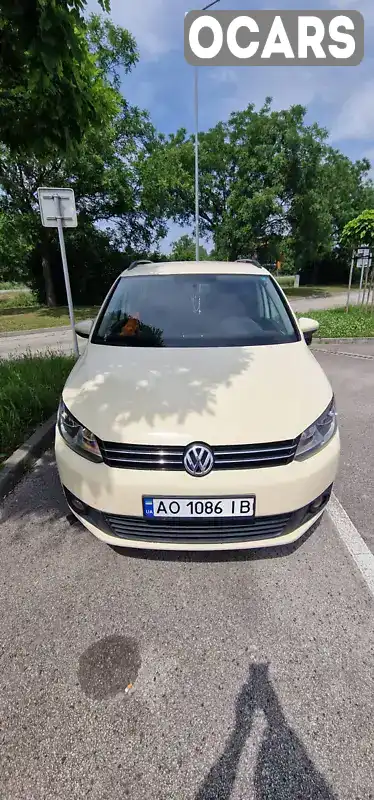 Мінівен Volkswagen Touran 2012 1.6 л. Автомат обл. Закарпатська, Ужгород - Фото 1/20