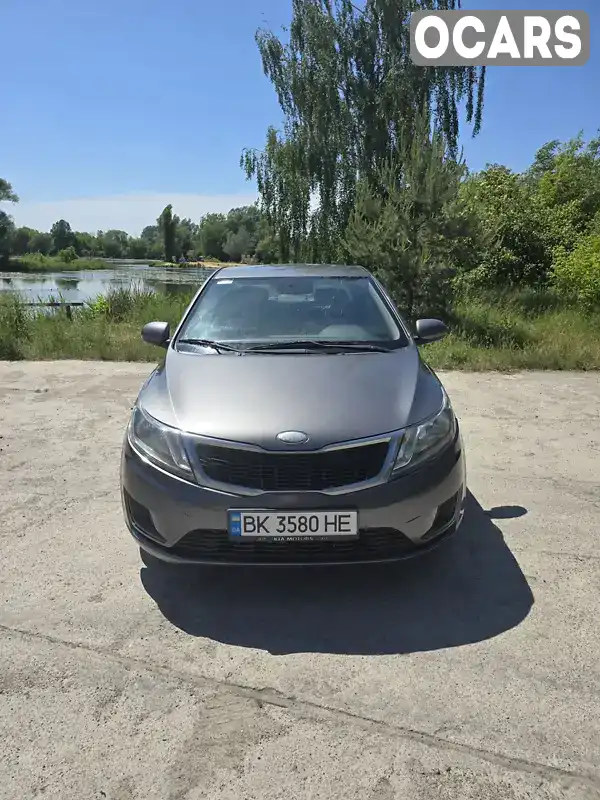 Седан Kia Rio 2013 1.4 л. Автомат обл. Рівненська, Рівне - Фото 1/15