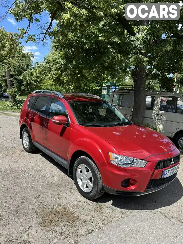 Внедорожник / Кроссовер Mitsubishi Outlander XL 2010 2.36 л. Автомат обл. Харьковская, Харьков - Фото 1/15