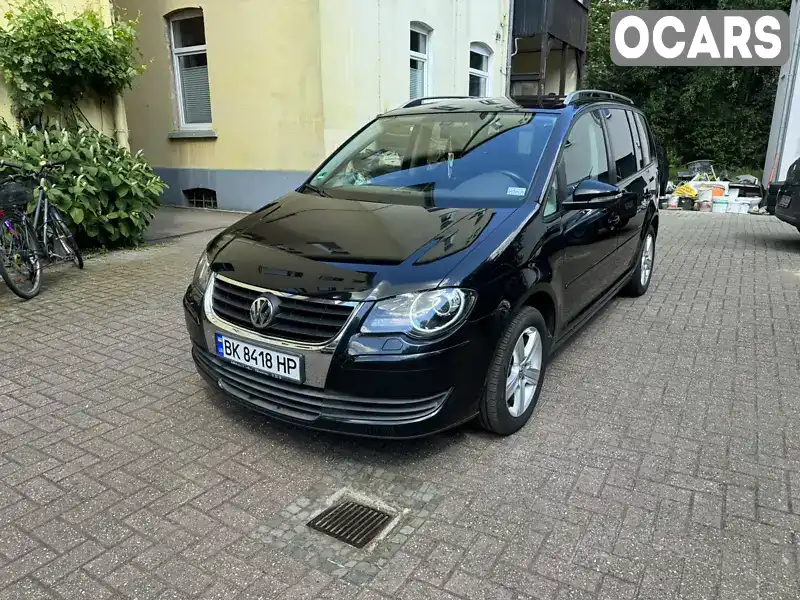 Мінівен Volkswagen Touran 2010 1.9 л. Ручна / Механіка обл. Волинська, Ківерці - Фото 1/21