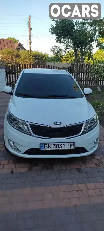 Седан Kia Rio 2013 1.4 л. Автомат обл. Рівненська, Острог - Фото 1/21